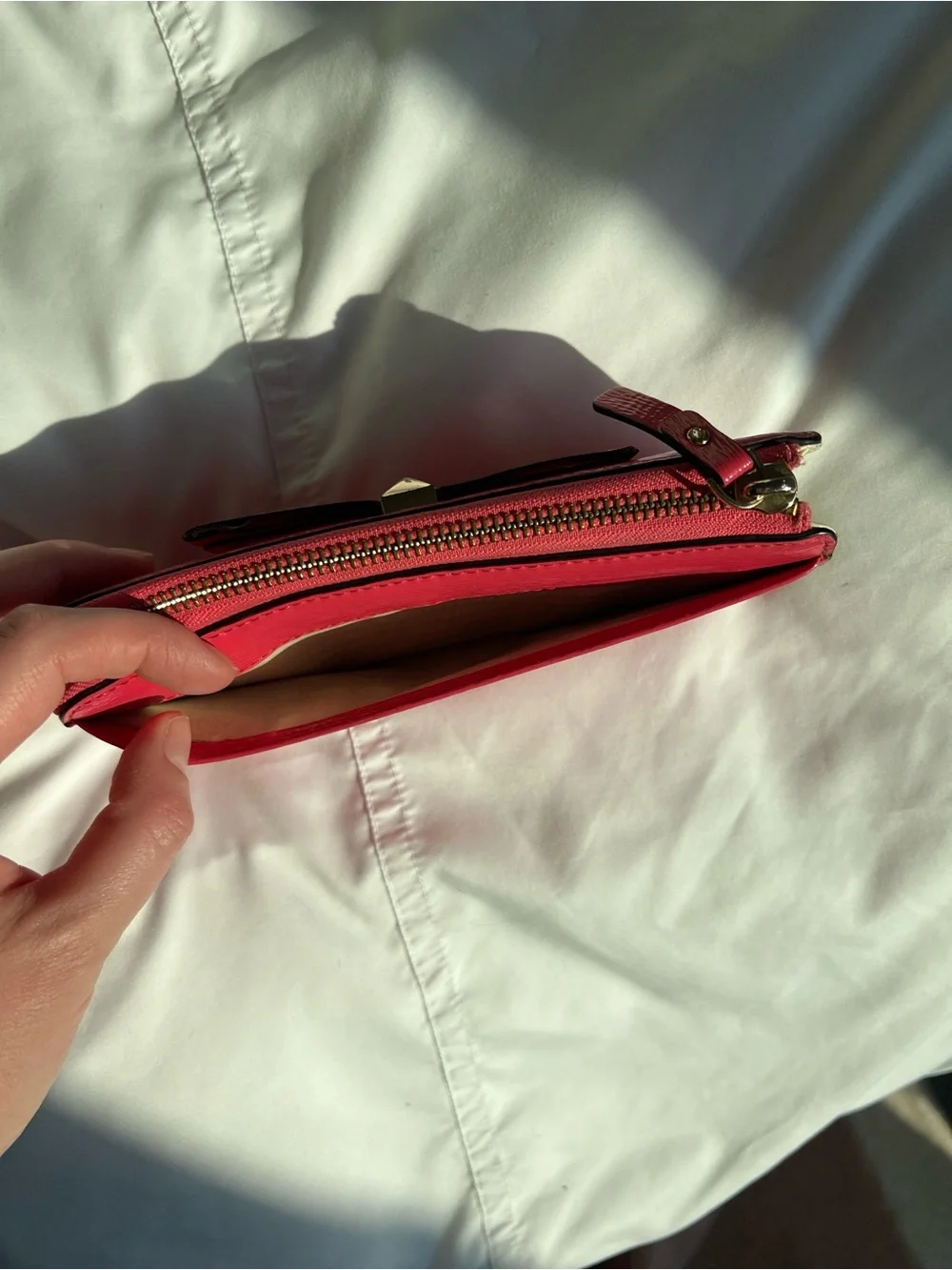 kate spade holly street Lacey zip-around wallet Coral/Pink